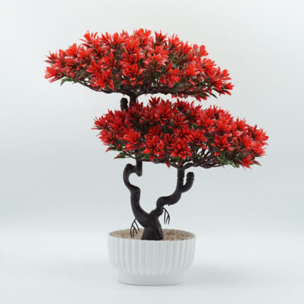 Decoración de mesa en maceta con flores artificiales